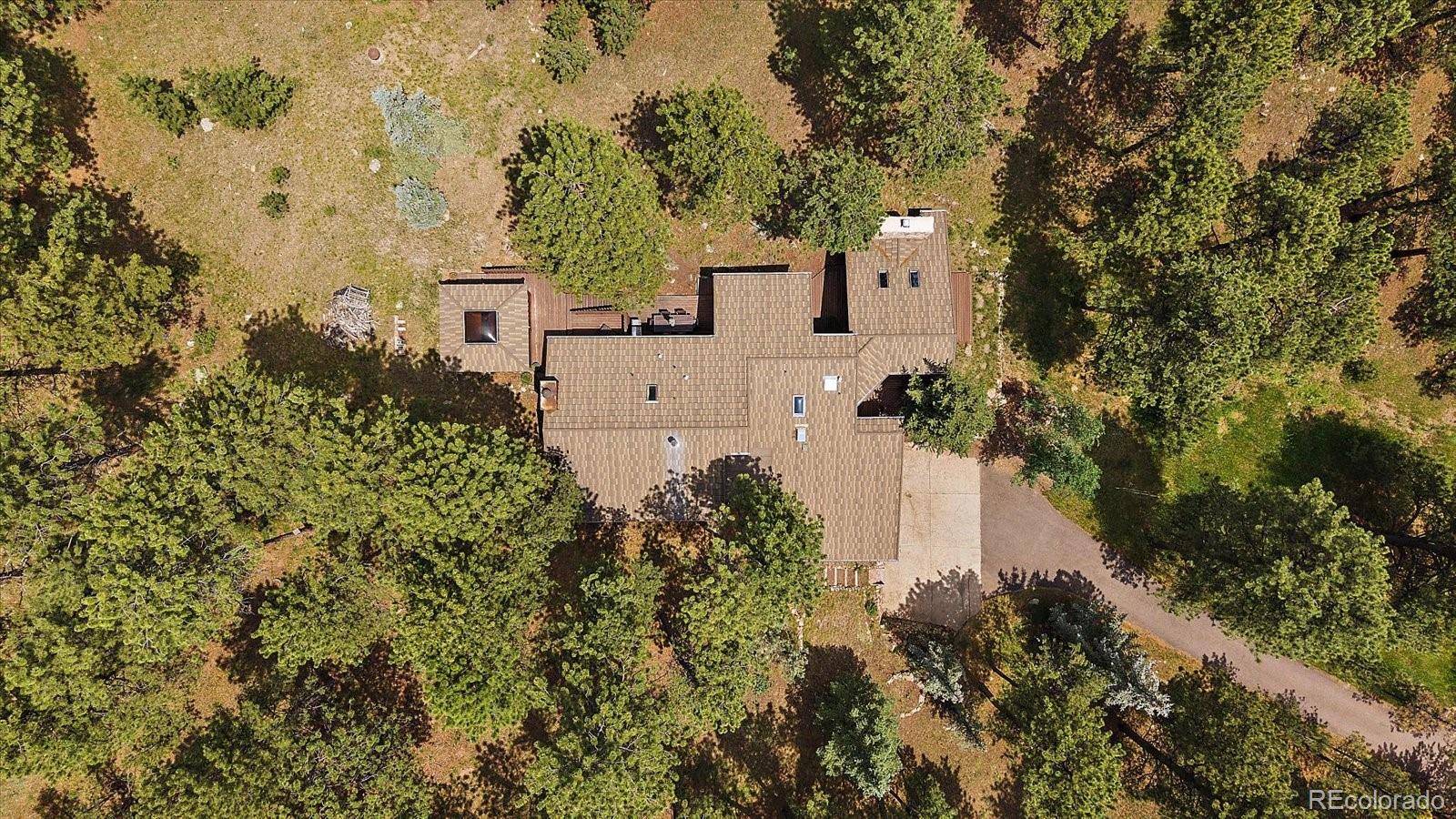 3251 Interlocken Drive Evergreen, CO 80439 - Photo 34 of 43 an aerial view of residential house with outdoor space