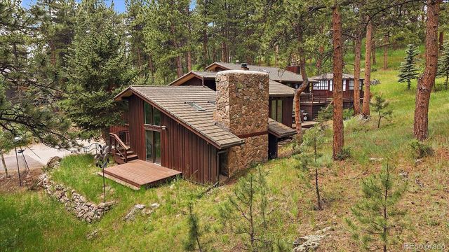 a view of a dinning table and chairs in the patio