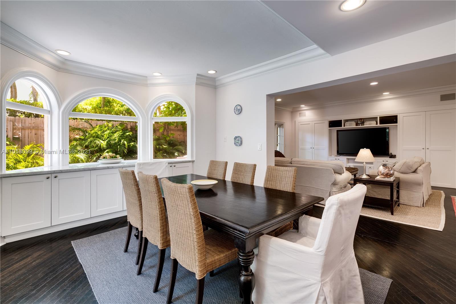 4288 Douglas Road Coconut Grove, FL 33133 - Photo 21 of 69 a view of a dining room with furniture and a large window