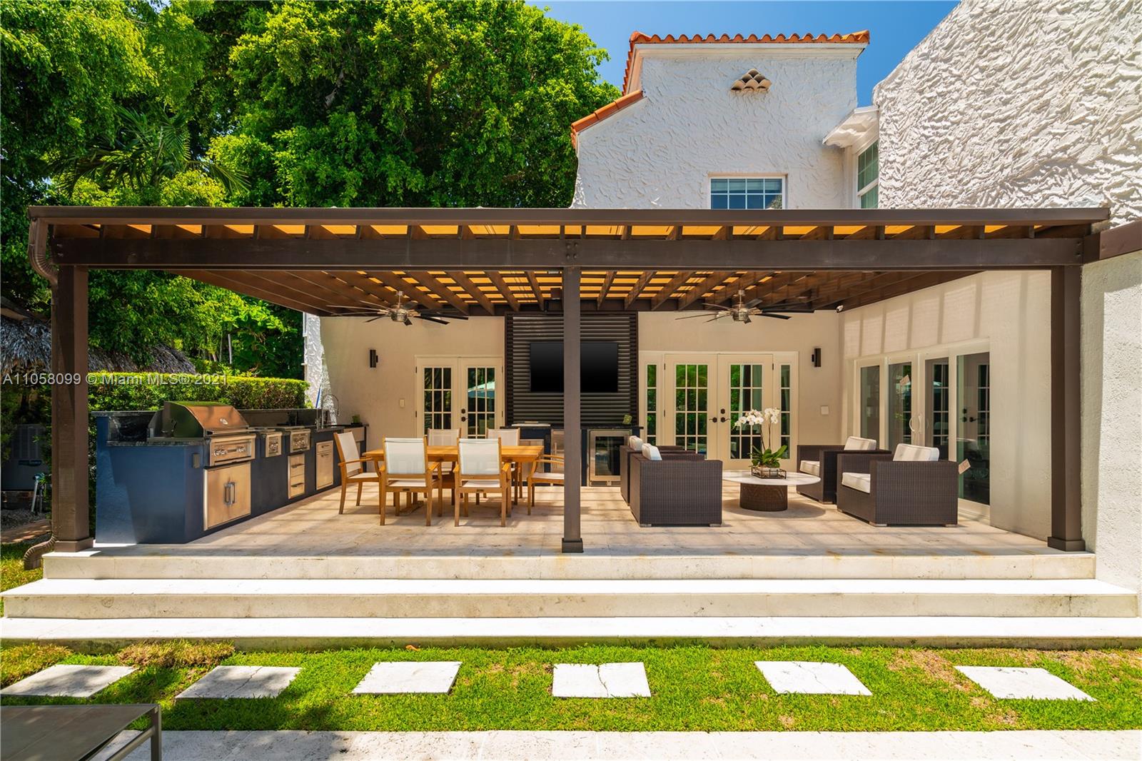 4288 Douglas Road Coconut Grove, FL 33133 - Photo 45 of 69 a view of a patio with table and chairs