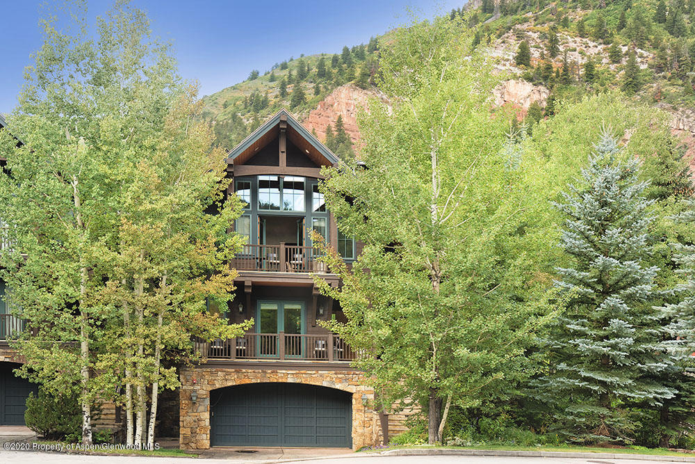 32 Prospector Road Aspen, CO 81611 - Photo 17 of 19 front view of a house with a small yard