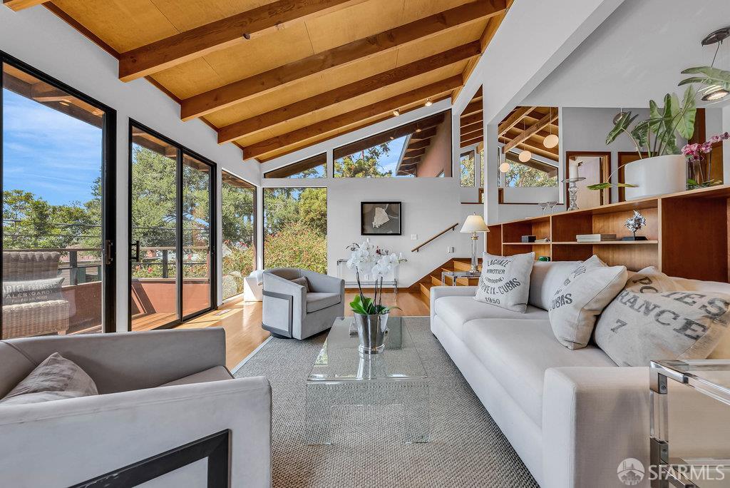 520 Coventry Road Kensington, CA 94707 - Photo 2 of 91 a living room with furniture and floor to ceiling windows