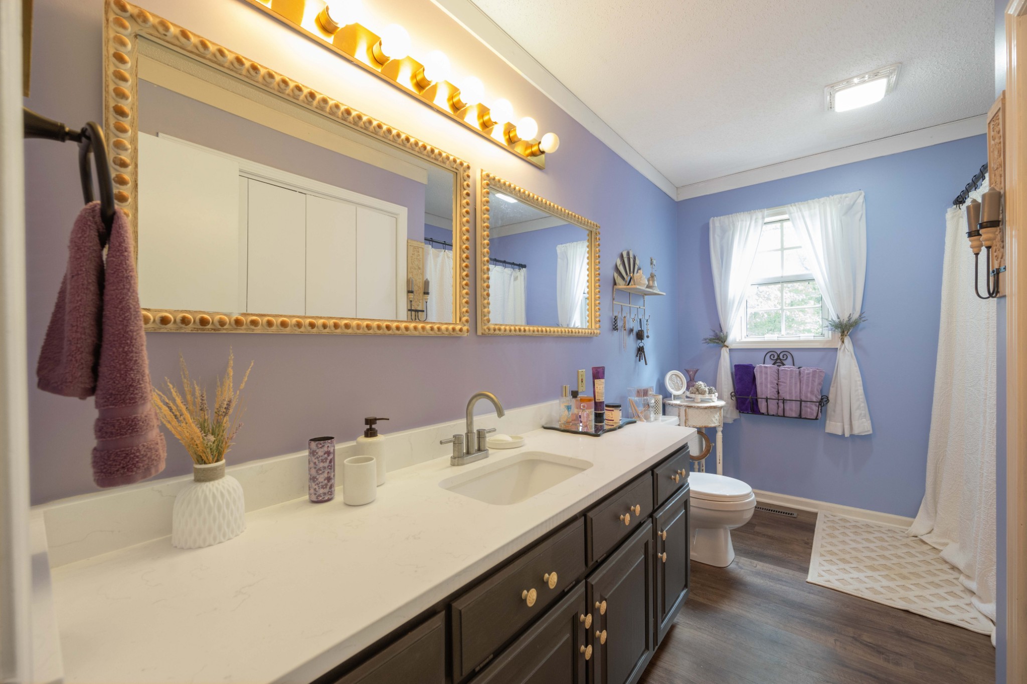 5935 Old Stage Road Huntingdon, TN 38344 - Photo 23 of 29 a bathroom with a double vanity sink mirror and toilet