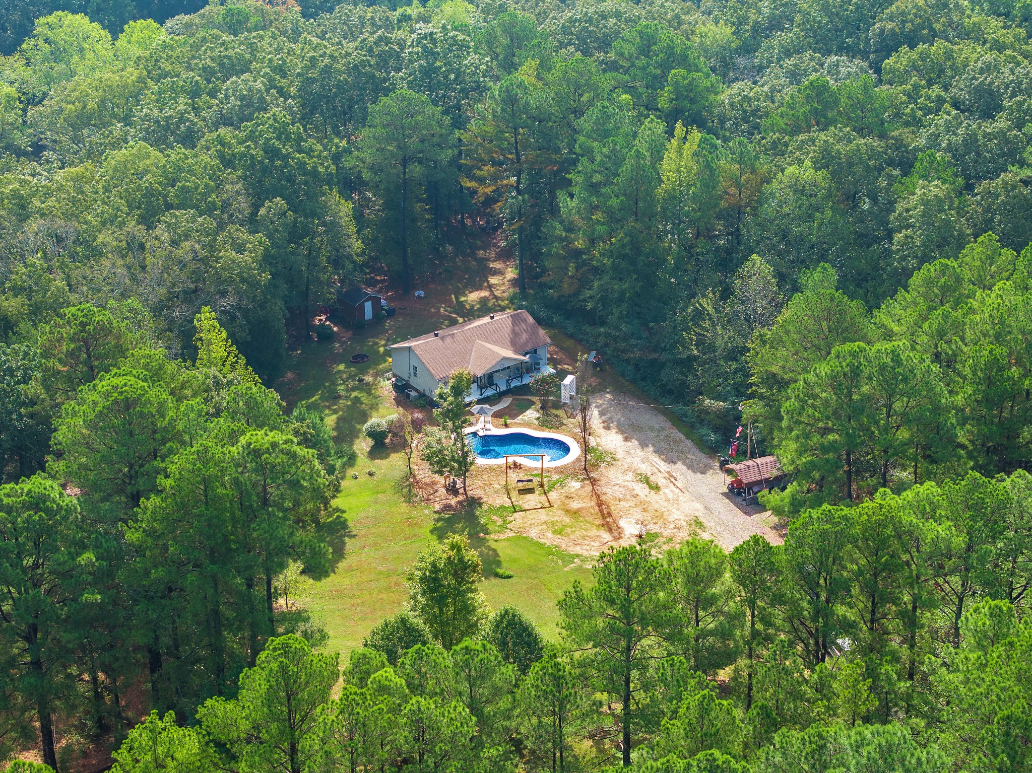 5935 Old Stage Road Huntingdon, TN 38344 - Photo 7 of 29 an aerial view of residential house with outdoor space and trees all around