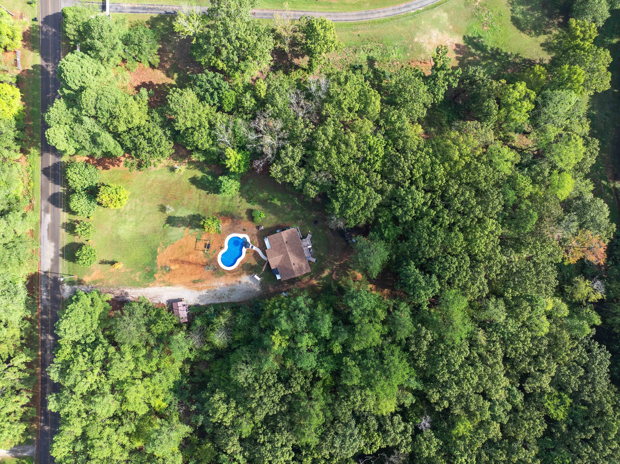 5935 Old Stage Road Huntingdon, TN 38344 - Photo 8 of 29 an aerial view of a house with a yard and garden