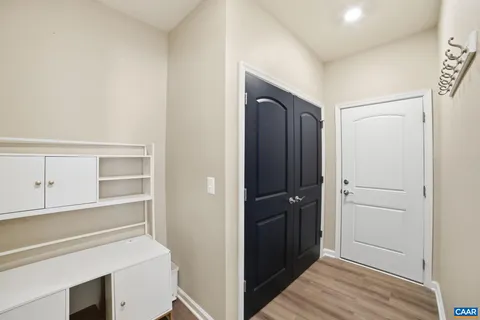 a view of a closet in the kitchen