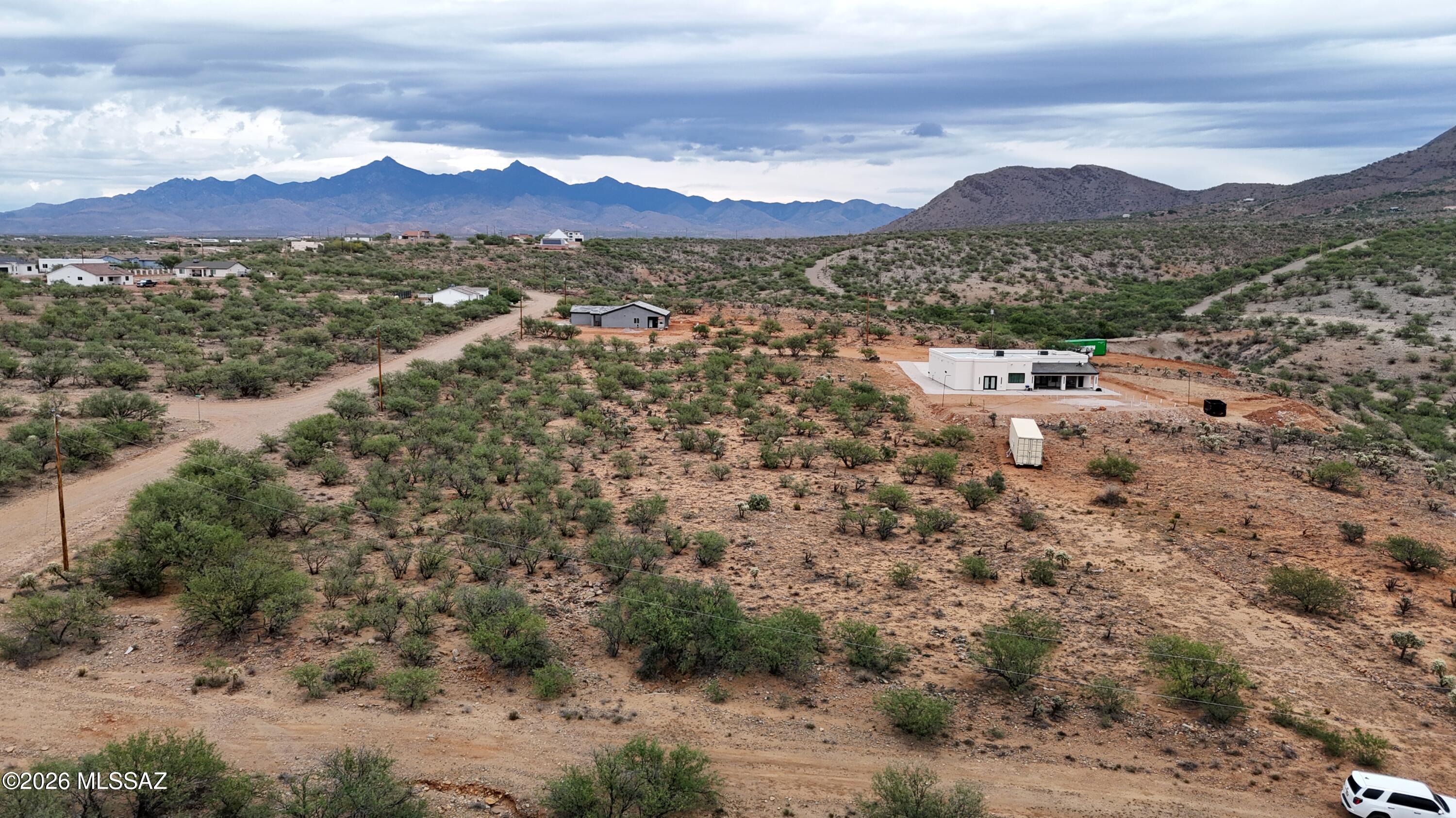 203 Loza Court, Unit 71 Rio Rico, AZ 85648 - Photo 3 of 11 a view of a city with mountain