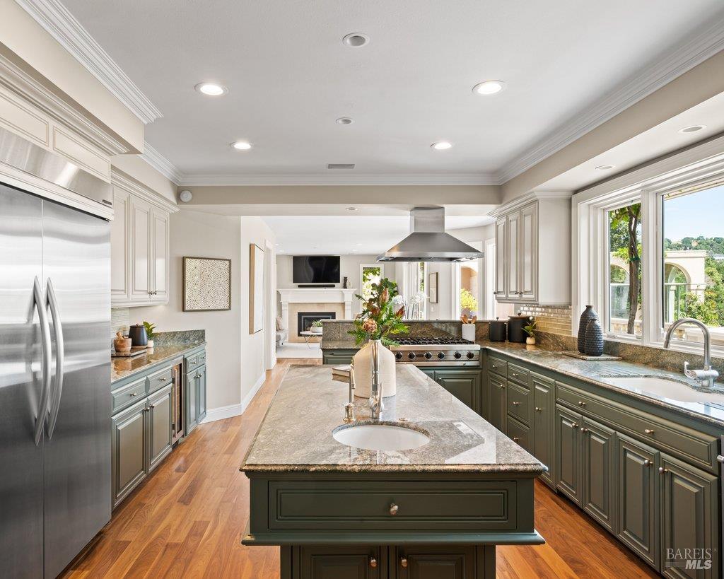 82 McNear Drive San Rafael, CA 94901 - Photo 19 of 54 a large kitchen with granite countertop lots of counter top space