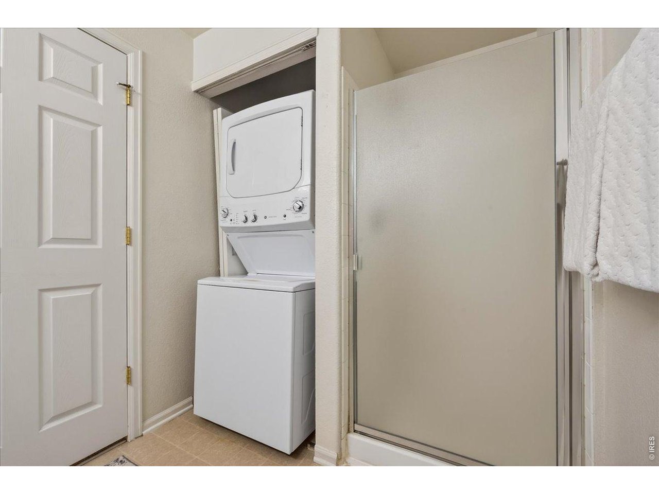 10381 Cook Way, Unit 202 Thornton, CO 80229 - Photo 21 of 38 Laundry is located on the main level with a stackable washer and dryer.