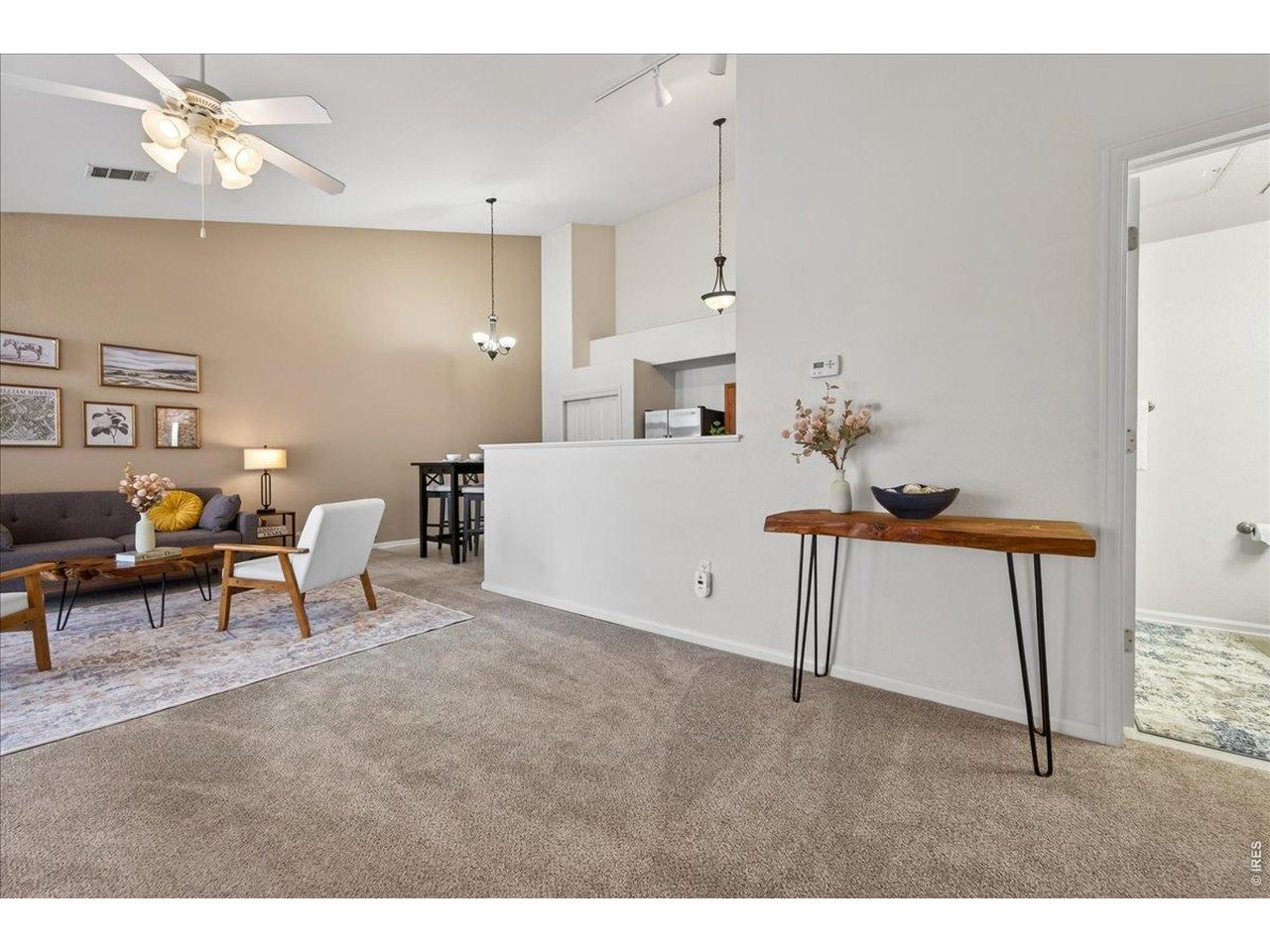 10381 Cook Way, Unit 202 Thornton, CO 80229 - Photo 5 of 38 Light and neutral tones throughout the home are ready for your personalization.