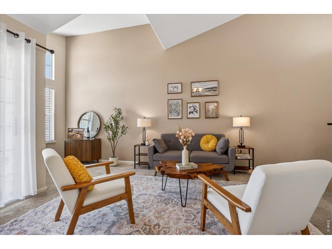 10381 Cook Way, Unit 202 Thornton, CO 80229 - Photo 37 of 38 Step inside to an open and airy floor plan highlighted by soaring vaulted ceilings, abundant natural light, and inviting living spaces throughout.
