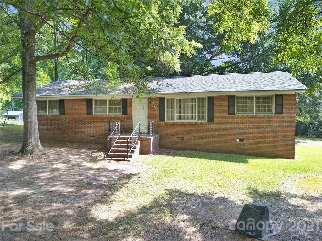 2640 Holbrook Road Fort Mill, SC 29715 - Photo 1 of 24 a front view of a house with a yard