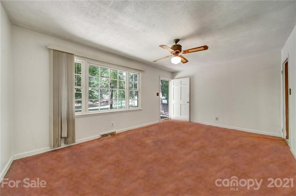 2640 Holbrook Road Fort Mill, SC 29715 - Photo 3 of 24 a view of a room with a ceiling fan and a window