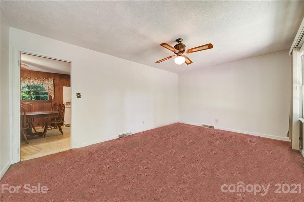 2640 Holbrook Road Fort Mill, SC 29715 - Photo 4 of 24 a view of a room with a ceiling fan and a window