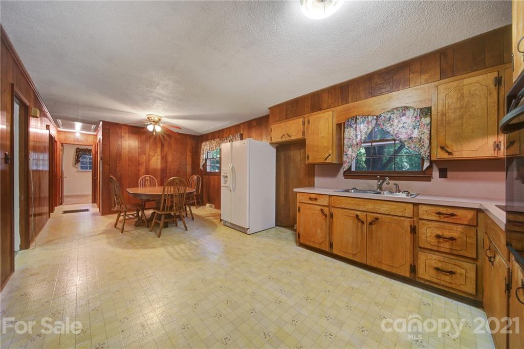 2640 Holbrook Road Fort Mill, SC 29715 - Photo 5 of 24 a view of a kitchen with furniture and a area