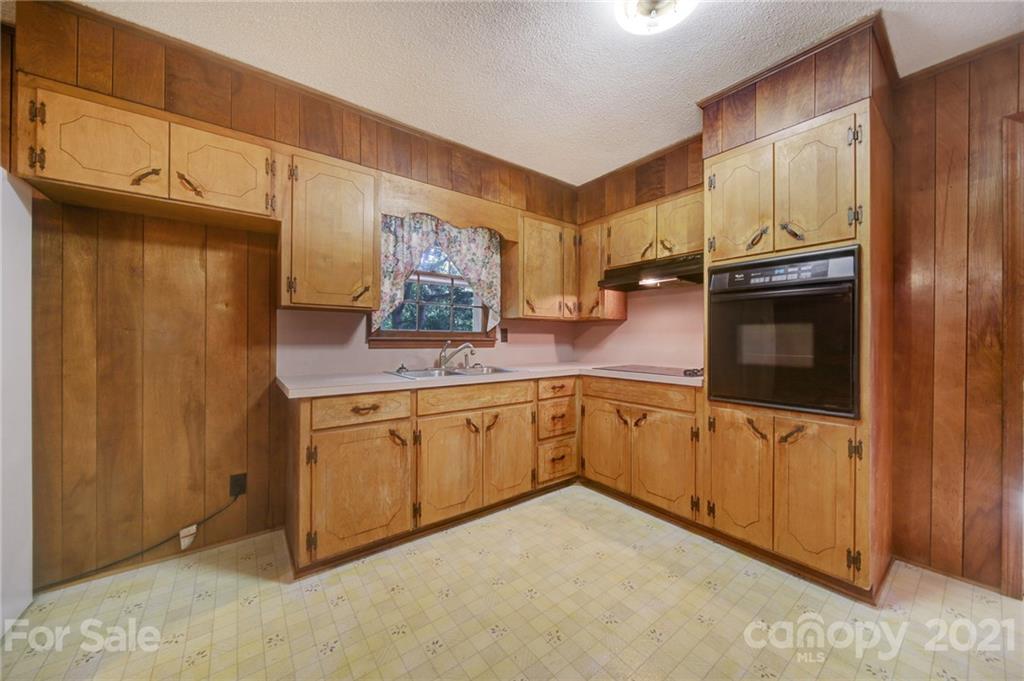 2640 Holbrook Road Fort Mill, SC 29715 - Photo 6 of 24 a kitchen with granite countertop cabinets stainless steel appliances and a counter space