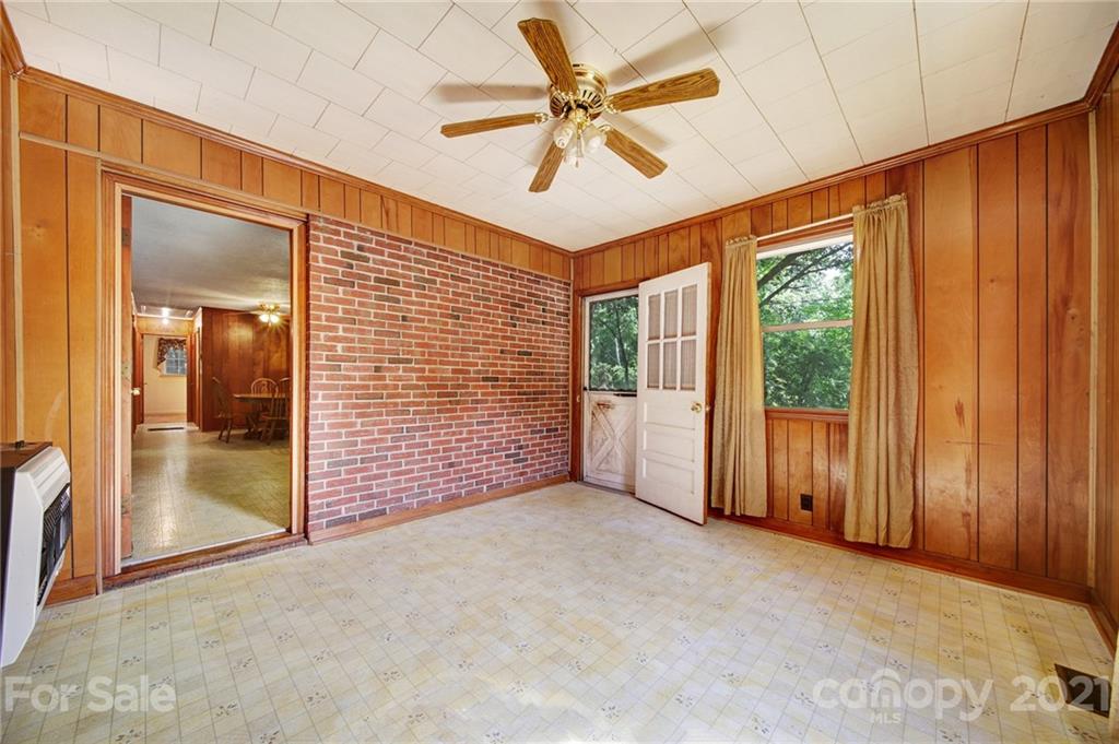 2640 Holbrook Road Fort Mill, SC 29715 - Photo 9 of 24 an empty room with windows and fan