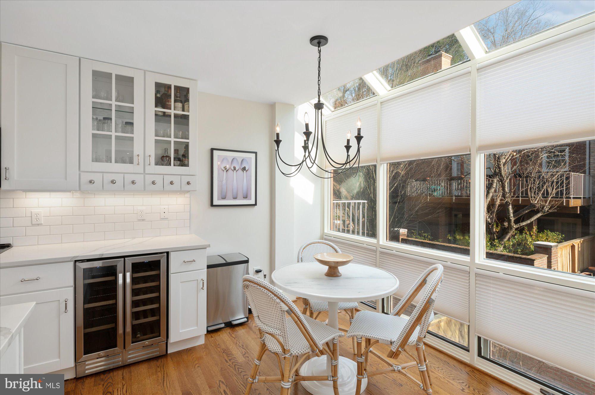 8005 Quarry Ridge Way Bethesda, MD 20817 - Photo 17 of 40 a view of a dining room with furniture window and wooden floor