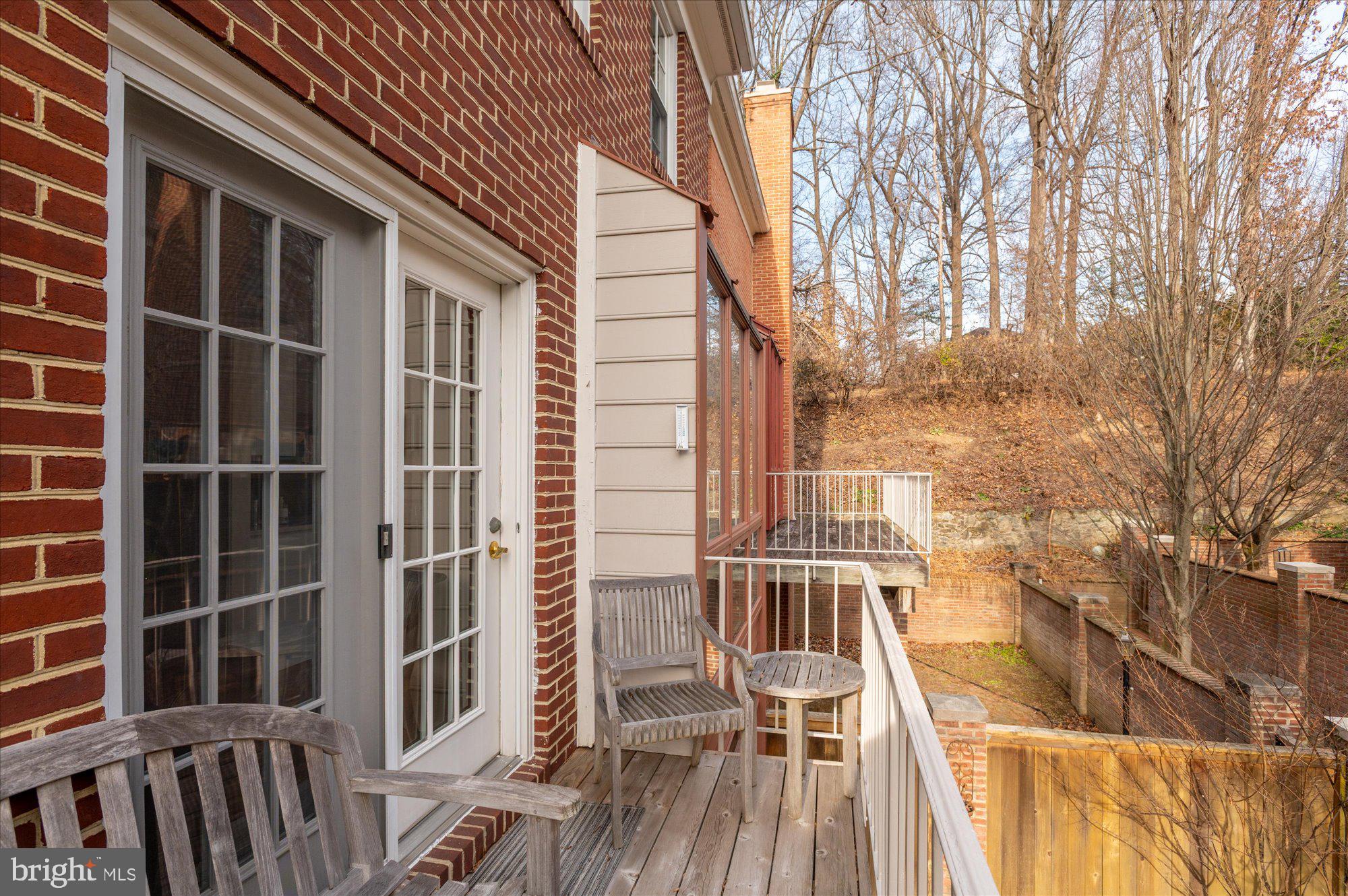 8005 Quarry Ridge Way Bethesda, MD 20817 - Photo 18 of 40 a view of balcony with wooden floor and fence