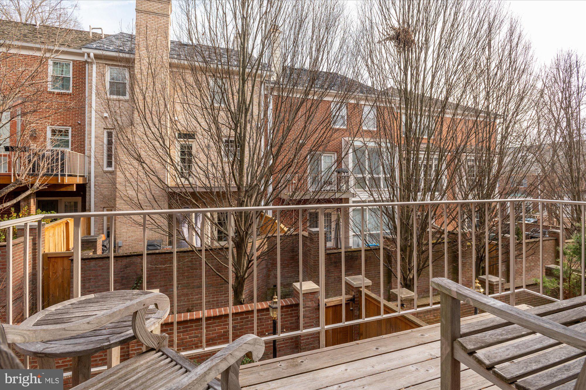 8005 Quarry Ridge Way Bethesda, MD 20817 - Photo 19 of 40 a view of balcony with wooden floor and fence
