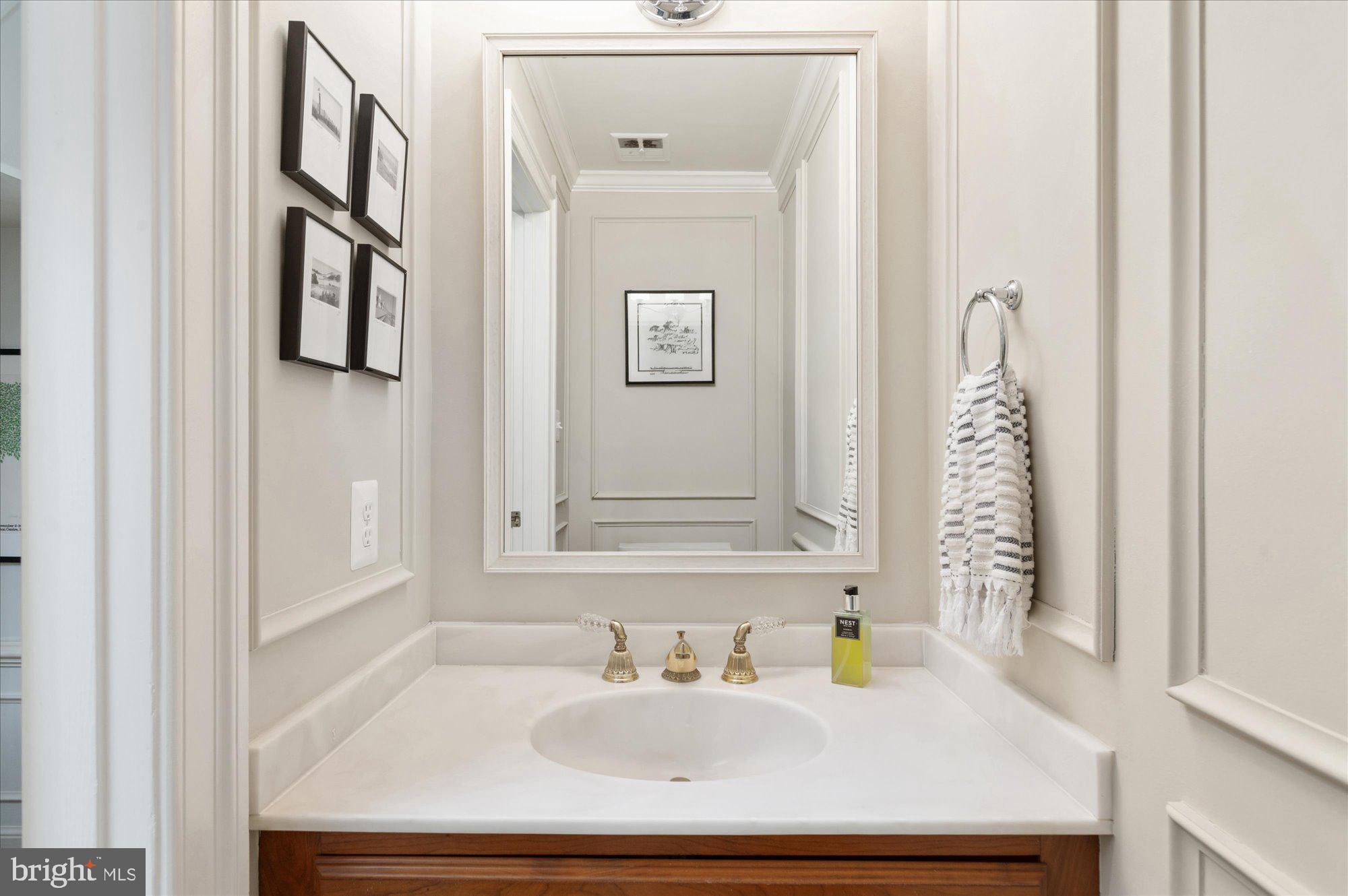 8005 Quarry Ridge Way Bethesda, MD 20817 - Photo 20 of 40 a bathroom with a sink and a mirror
