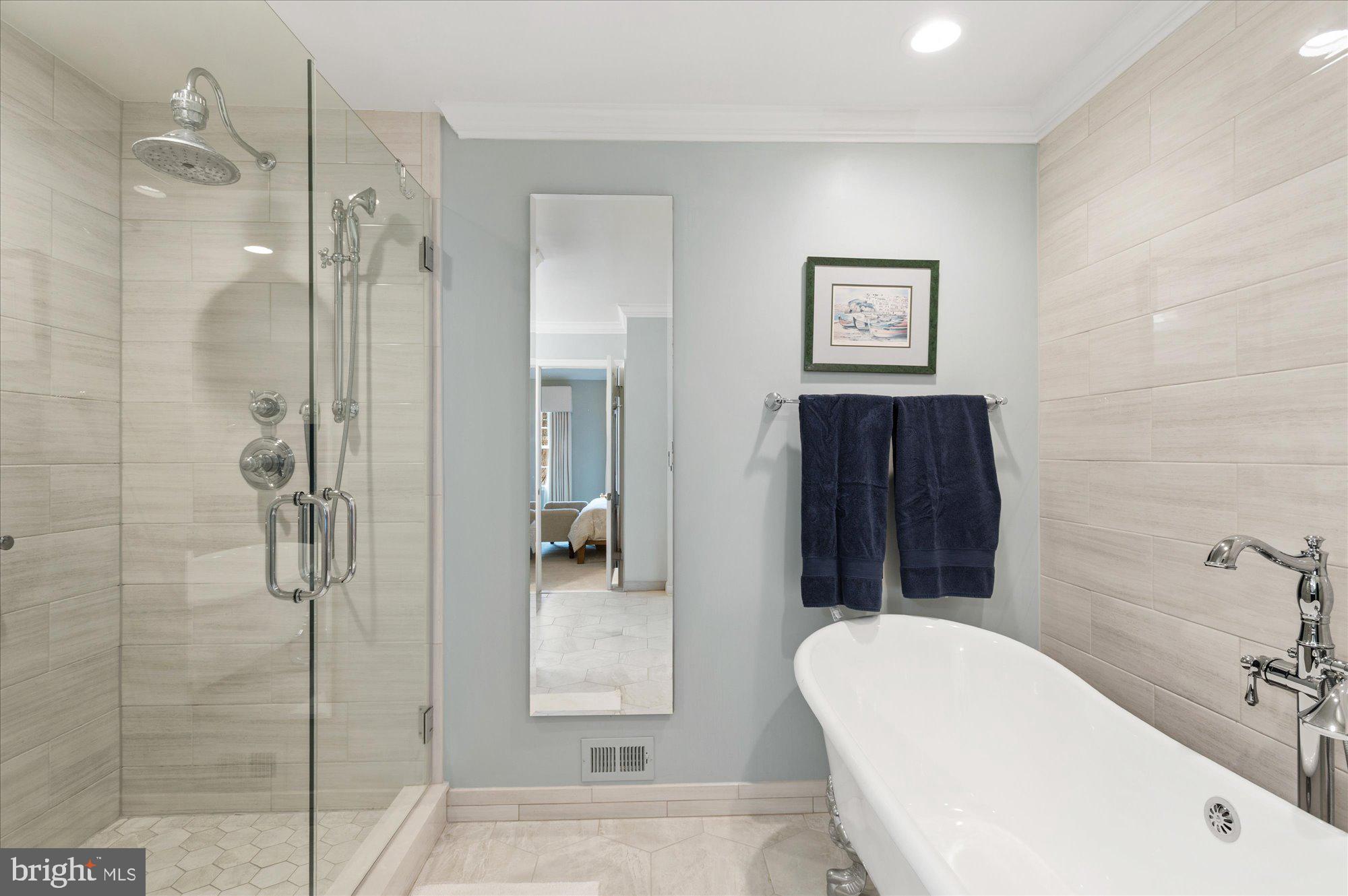 8005 Quarry Ridge Way Bethesda, MD 20817 - Photo 25 of 40 a bathroom with a toilet sink and shower