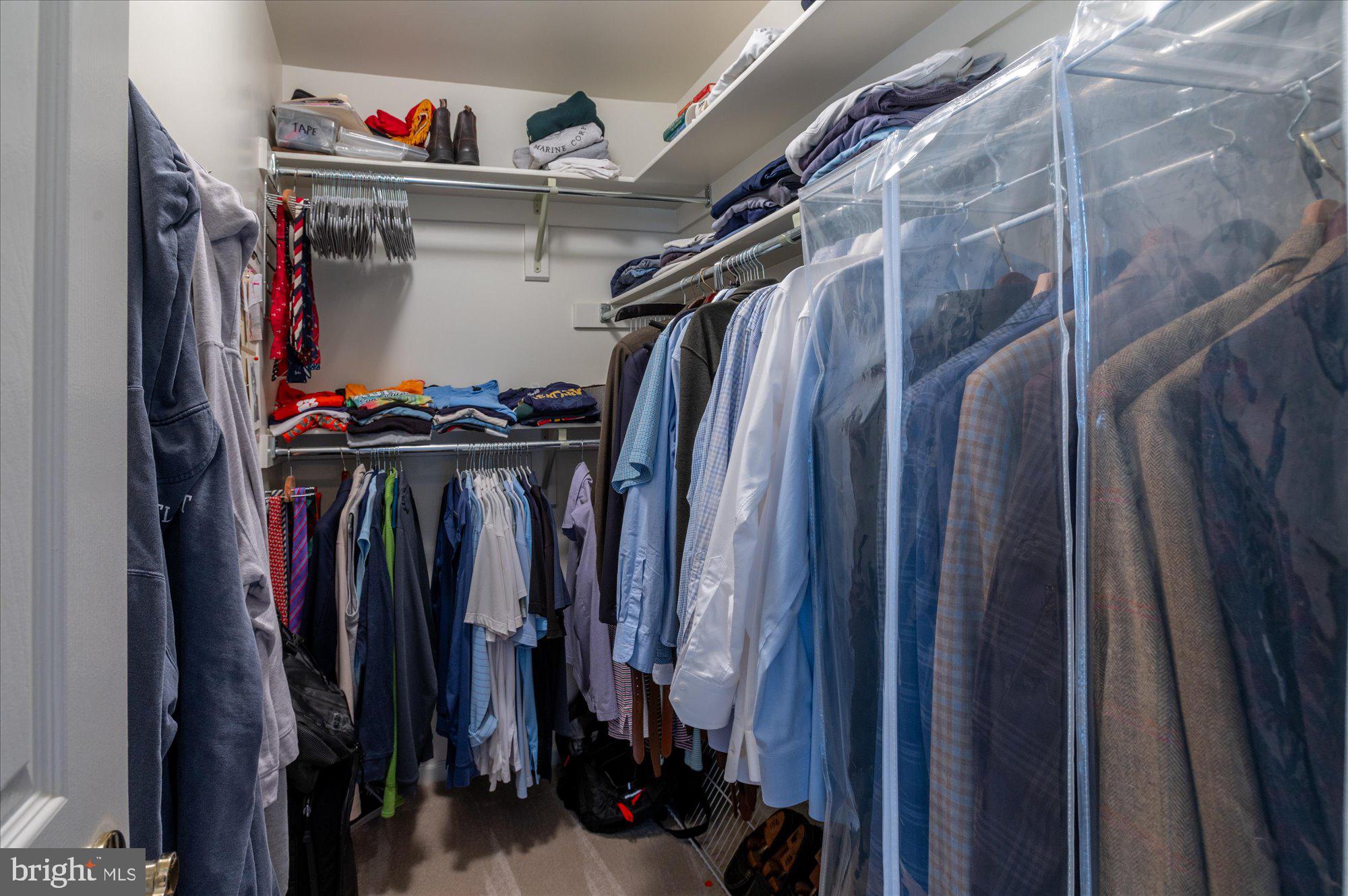 8005 Quarry Ridge Way Bethesda, MD 20817 - Photo 26 of 40 a view of walk in closet with clothes
