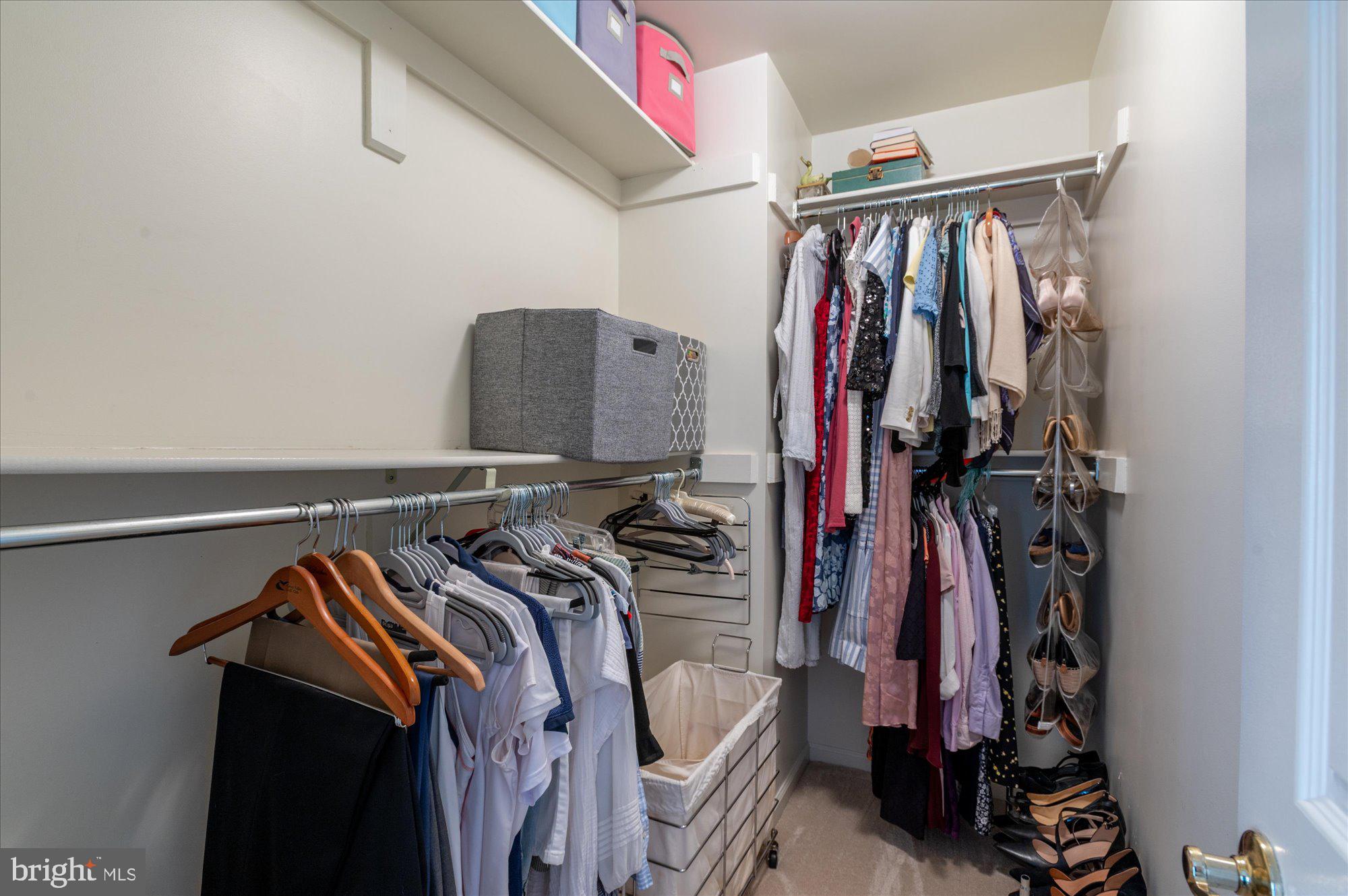 8005 Quarry Ridge Way Bethesda, MD 20817 - Photo 27 of 40 a view of walk in closet with clothes
