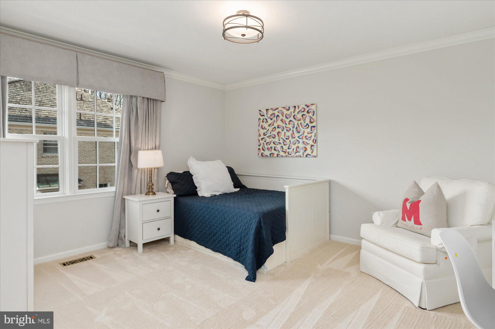 8005 Quarry Ridge Way Bethesda, MD 20817 - Photo 28 of 40 a bedroom with furniture and a window