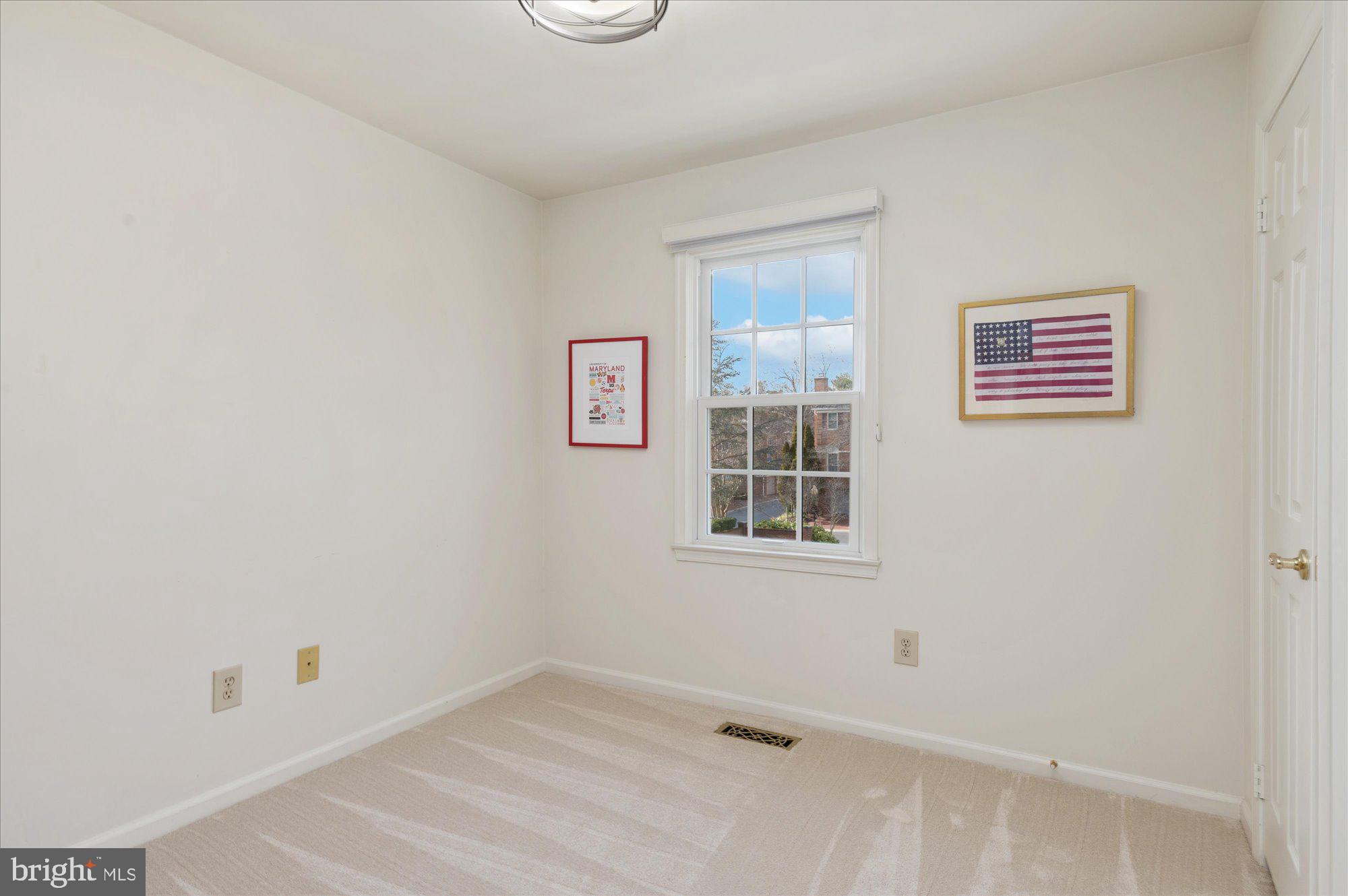8005 Quarry Ridge Way Bethesda, MD 20817 - Photo 29 of 40 an empty room with windows