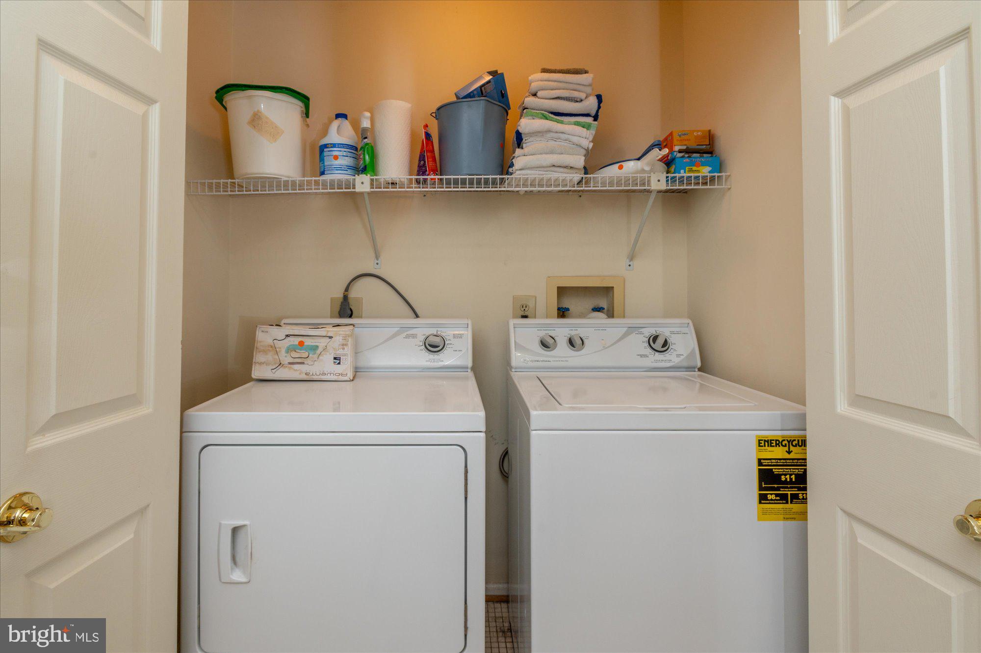 8005 Quarry Ridge Way Bethesda, MD 20817 - Photo 31 of 40 a utility room with dryer and washer