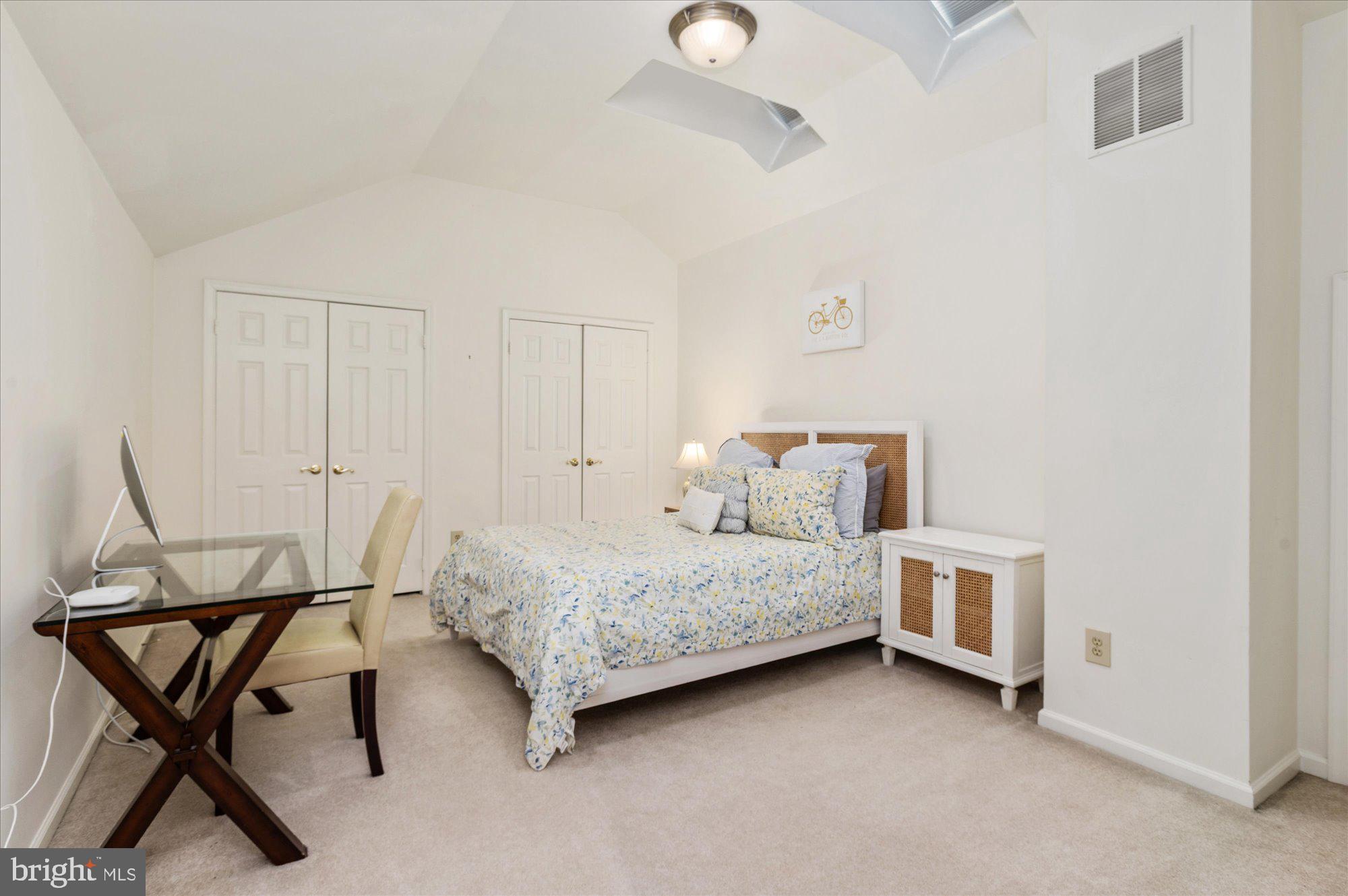 8005 Quarry Ridge Way Bethesda, MD 20817 - Photo 32 of 40 a bedroom with a bed and chair