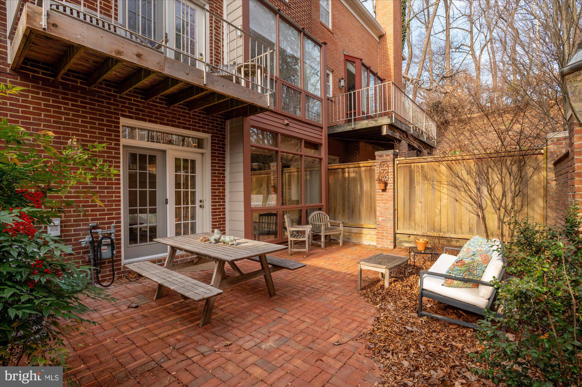 8005 Quarry Ridge Way Bethesda, MD 20817 - Photo 39 of 40 a building outdoor space with patio furniture and potted plants