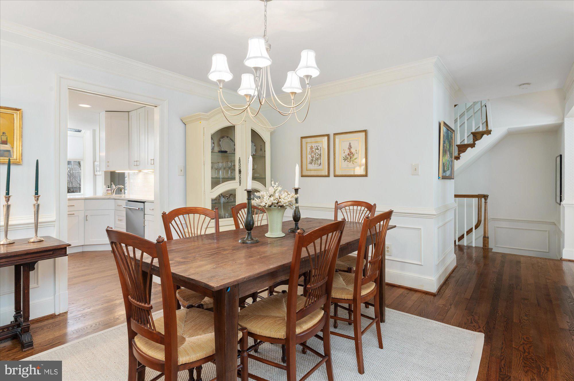 8005 Quarry Ridge Way Bethesda, MD 20817 - Photo 8 of 40 a view of a dining room with furniture and wooden floor