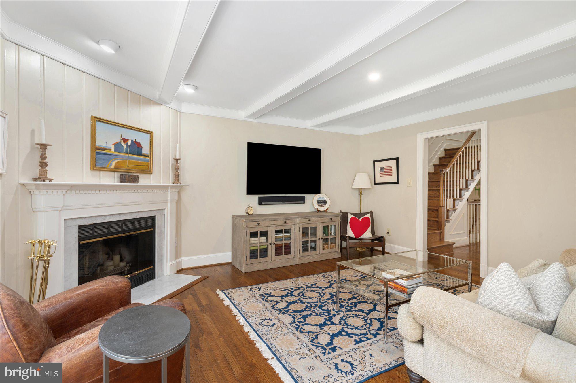 8005 Quarry Ridge Way Bethesda, MD 20817 - Photo 10 of 40 a living room with furniture and a flat screen tv