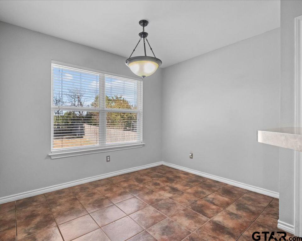 11230 Triple Crown Drive Flint, TX 75762 - Photo 12 of 19 a view of an empty room with a window