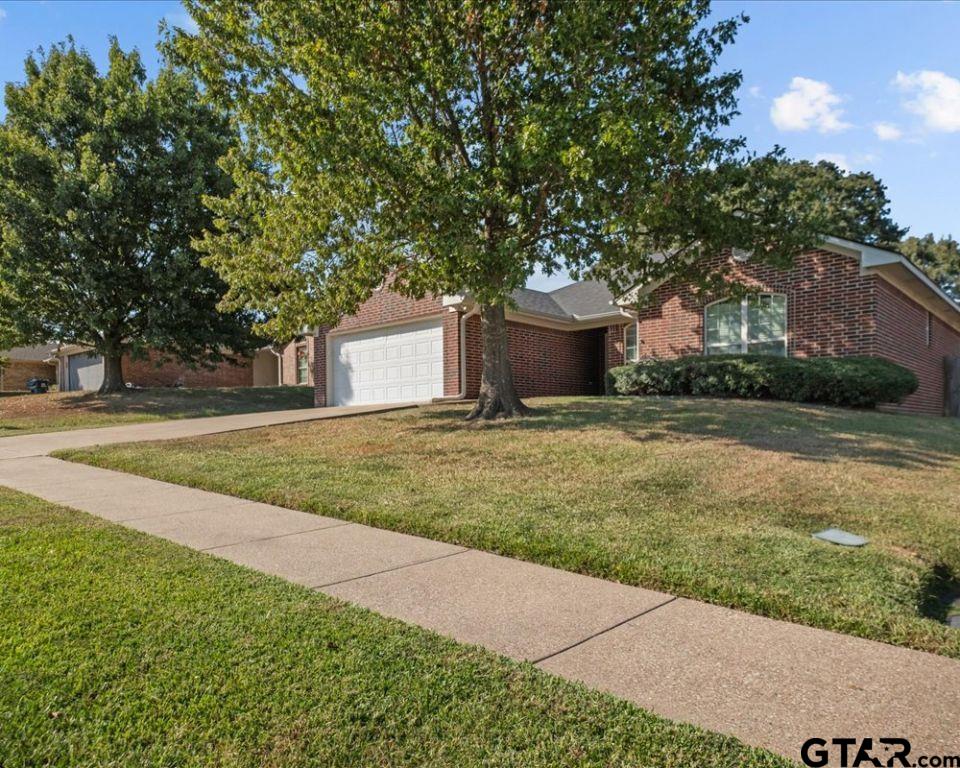 11230 Triple Crown Drive Flint, TX 75762 - Photo 2 of 19 a front view of house with yard and green space