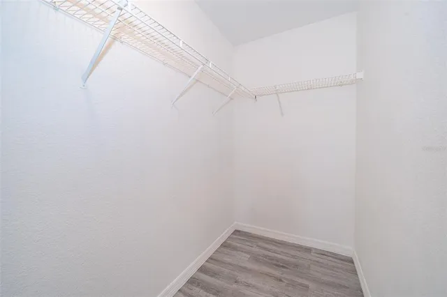 a view of a room with racks on the wall