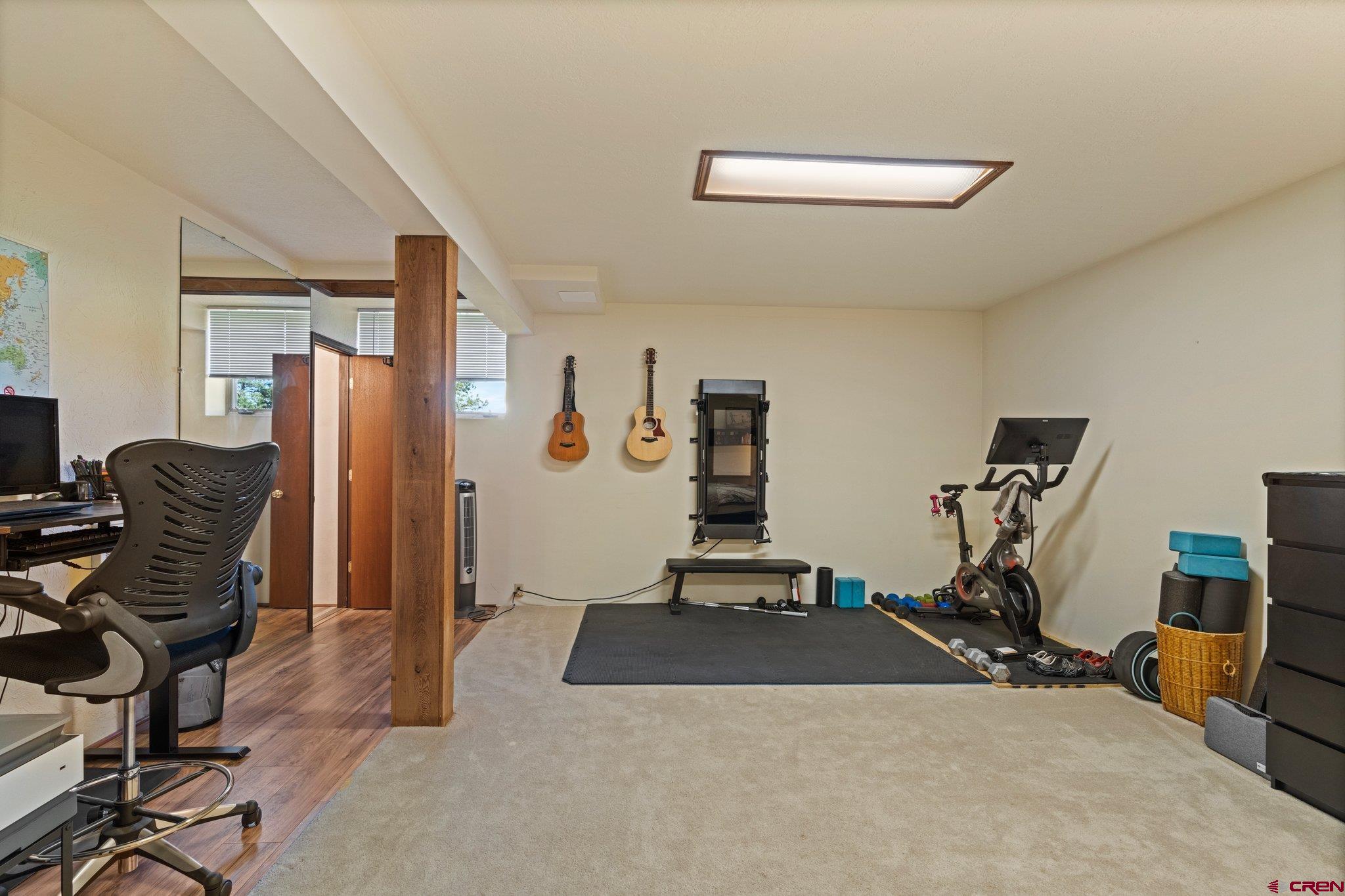 238 Pine Ridge Loop, Unit A1 Durango, CO 81301 - Photo 22 of 35 a view of a room with gym equipment