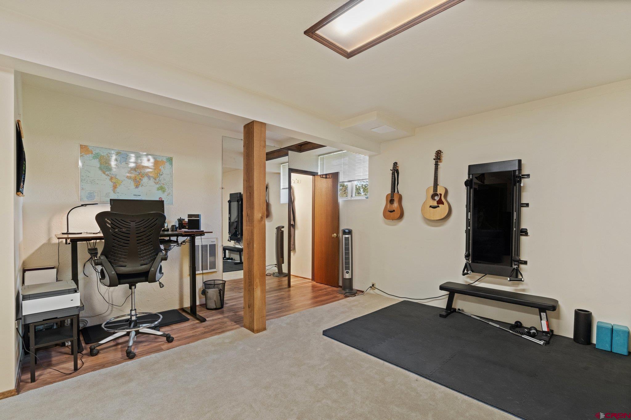 238 Pine Ridge Loop, Unit A1 Durango, CO 81301 - Photo 25 of 35 a view of a room with gym equipment