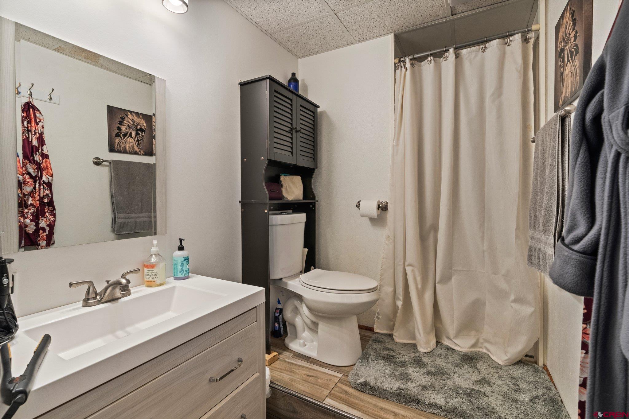 238 Pine Ridge Loop, Unit A1 Durango, CO 81301 - Photo 26 of 35 a bathroom with a sink toilet and shower