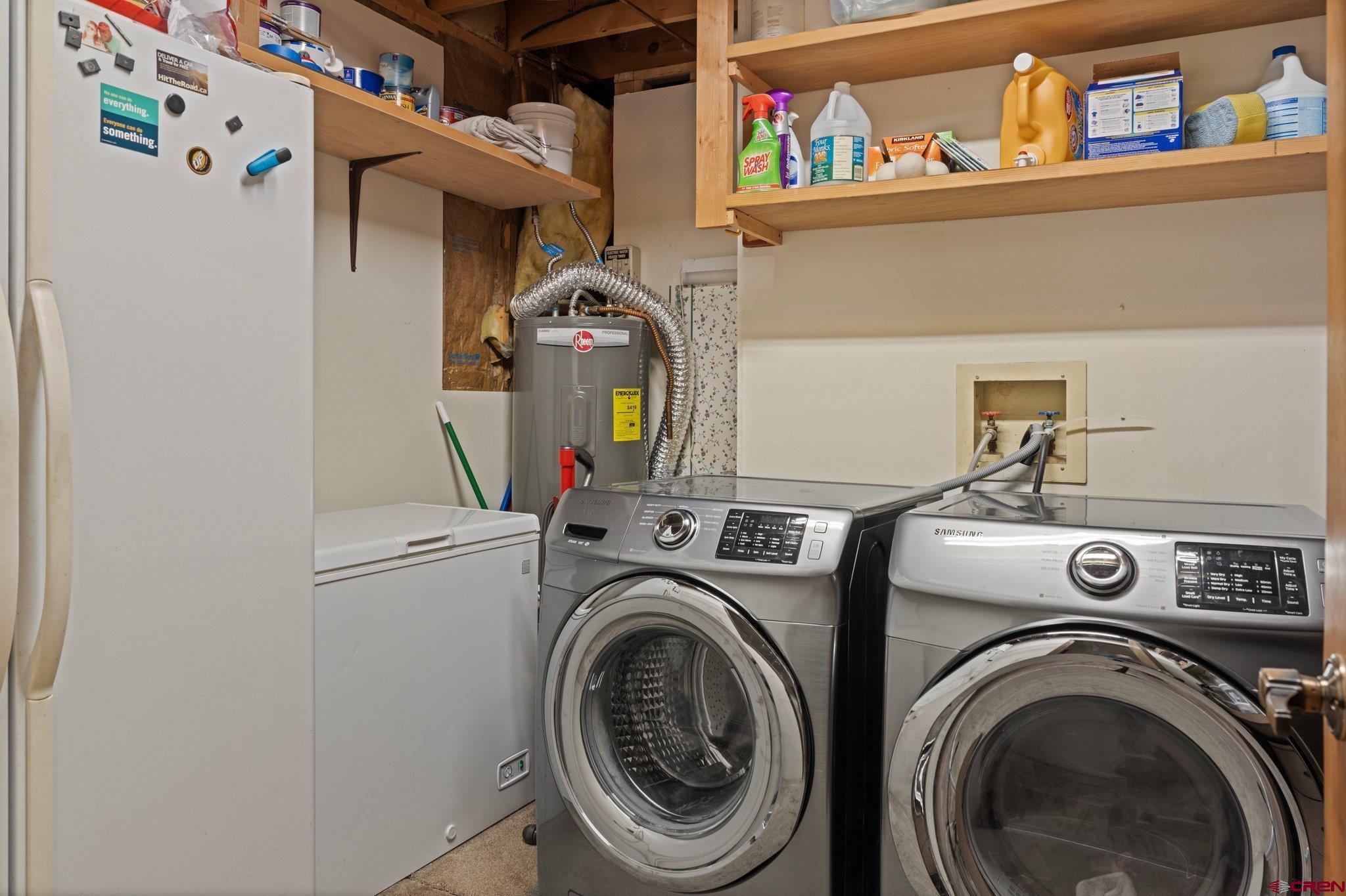 238 Pine Ridge Loop, Unit A1 Durango, CO 81301 - Photo 27 of 35 a utility room with dryer and washer