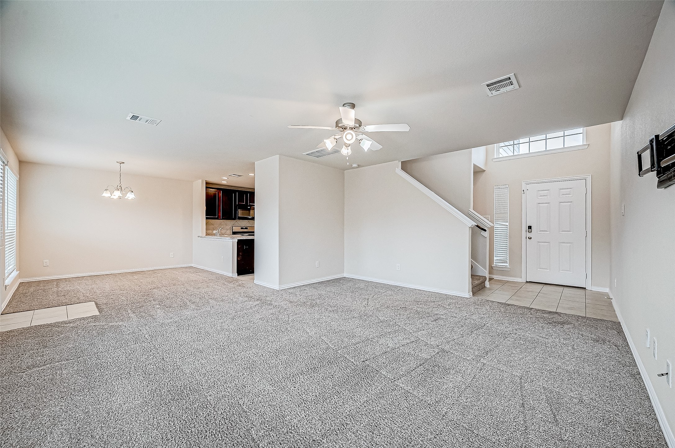 3406 Water Lilly Way Richmond, TX 77469 - Photo 12 of 44 a view of a livingroom with a ceiling fan