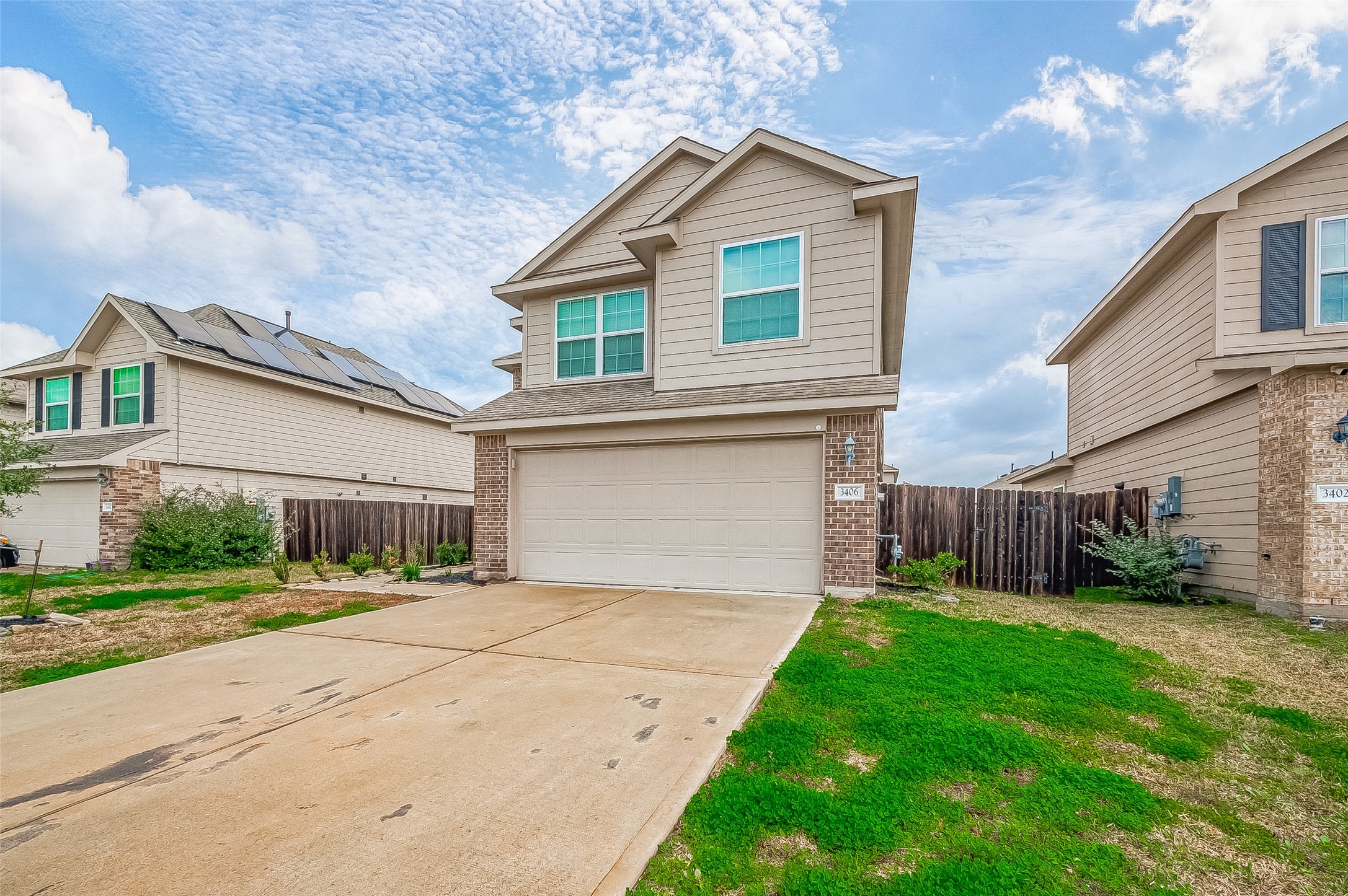 3406 Water Lilly Way Richmond, TX 77469 - Photo 2 of 44 a front view of house with yard and green space
