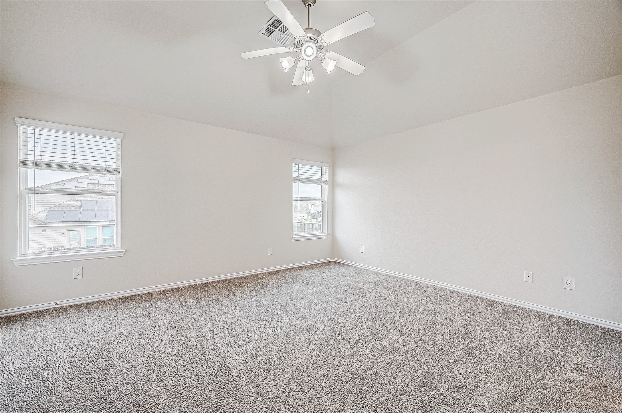 3406 Water Lilly Way Richmond, TX 77469 - Photo 24 of 44 an empty room with a window and a fan