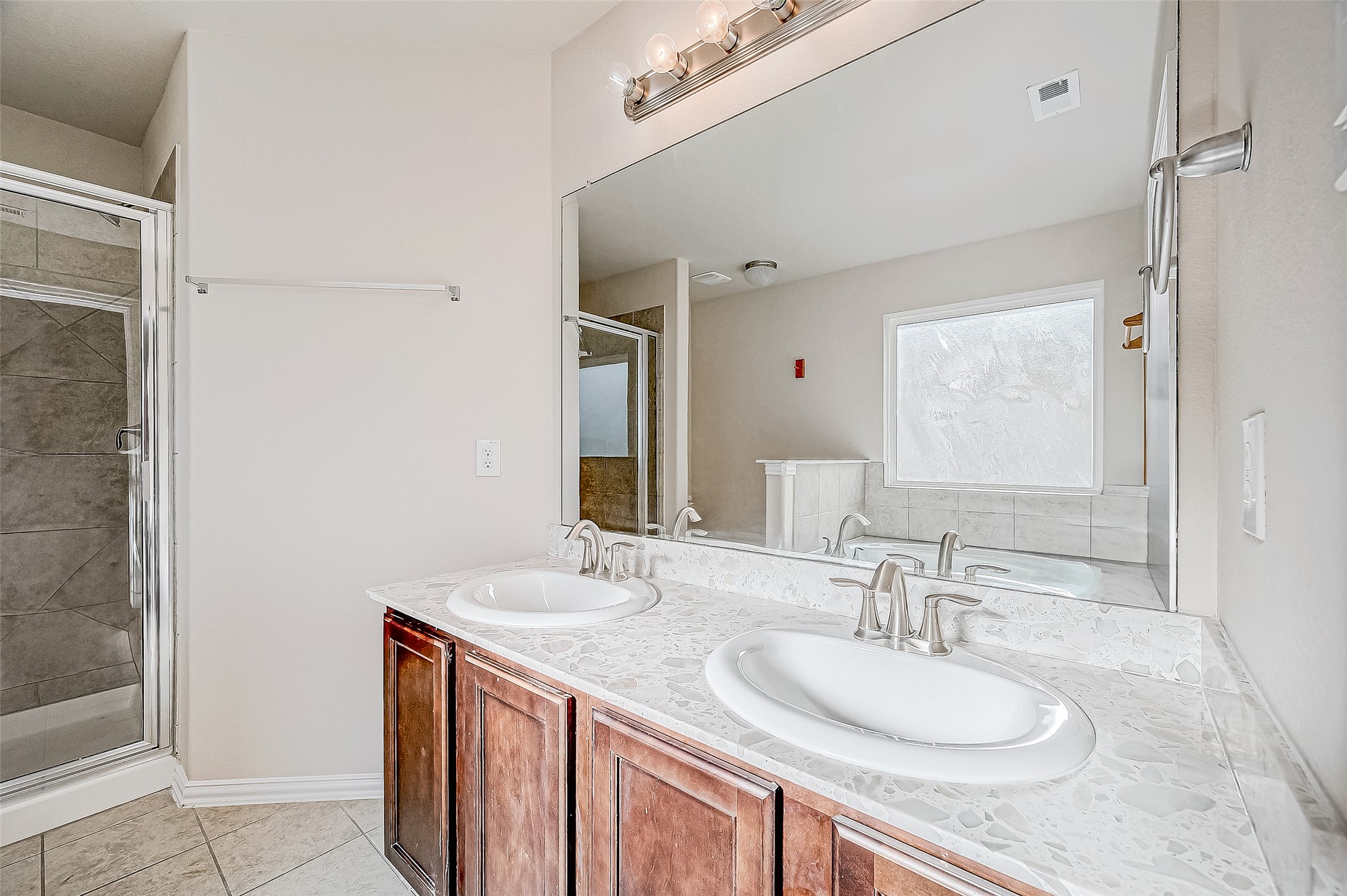 3406 Water Lilly Way Richmond, TX 77469 - Photo 28 of 44 a bathroom with a granite countertop sink and a mirror