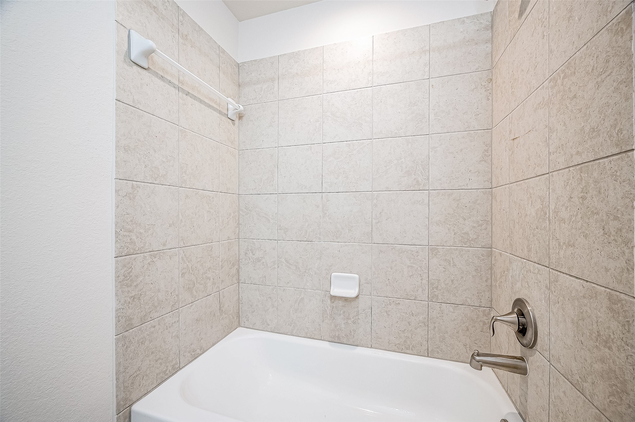3406 Water Lilly Way Richmond, TX 77469 - Photo 35 of 44 a bathroom with a bathtub