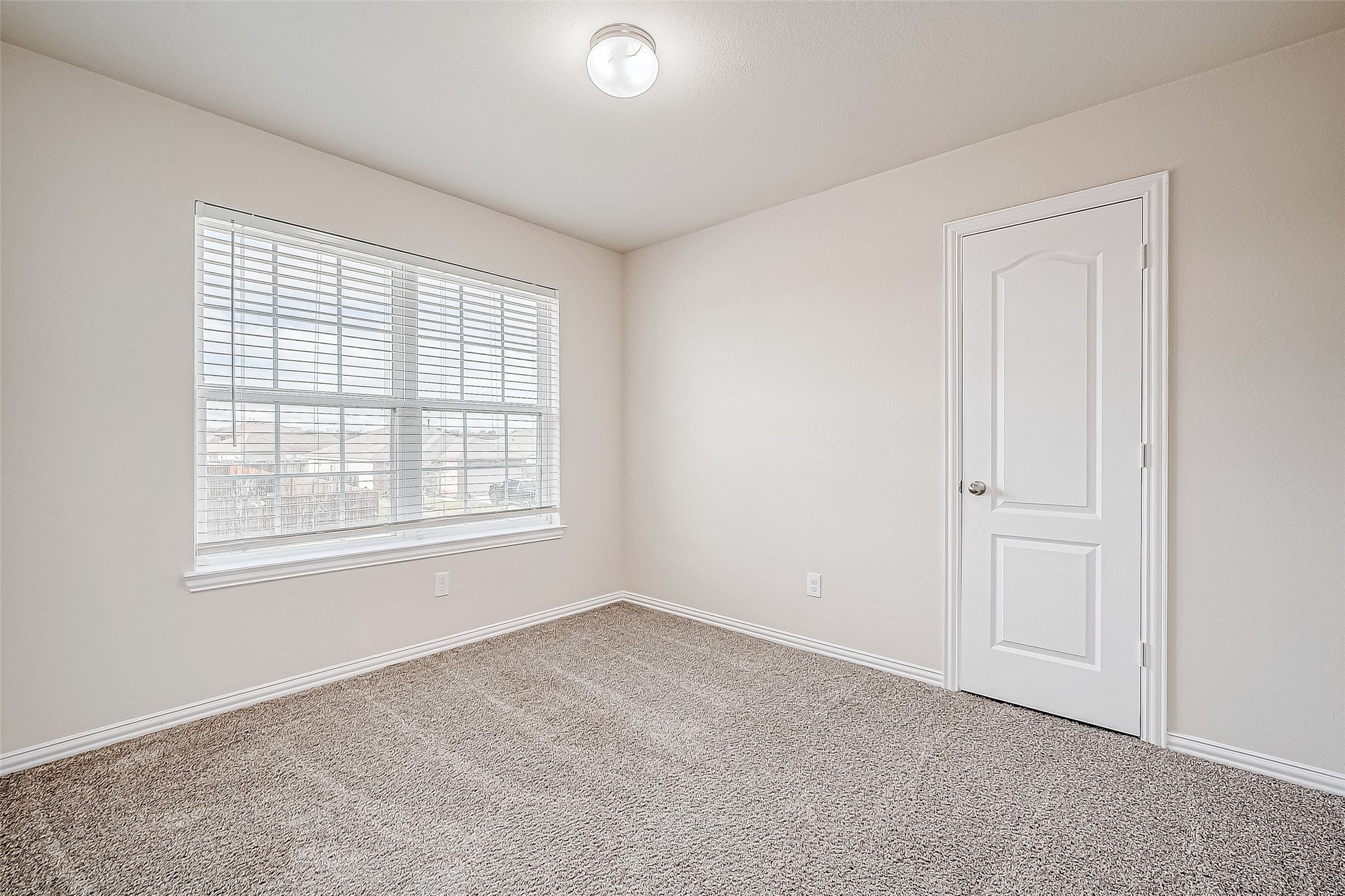 3406 Water Lilly Way Richmond, TX 77469 - Photo 36 of 44 an empty room with windows