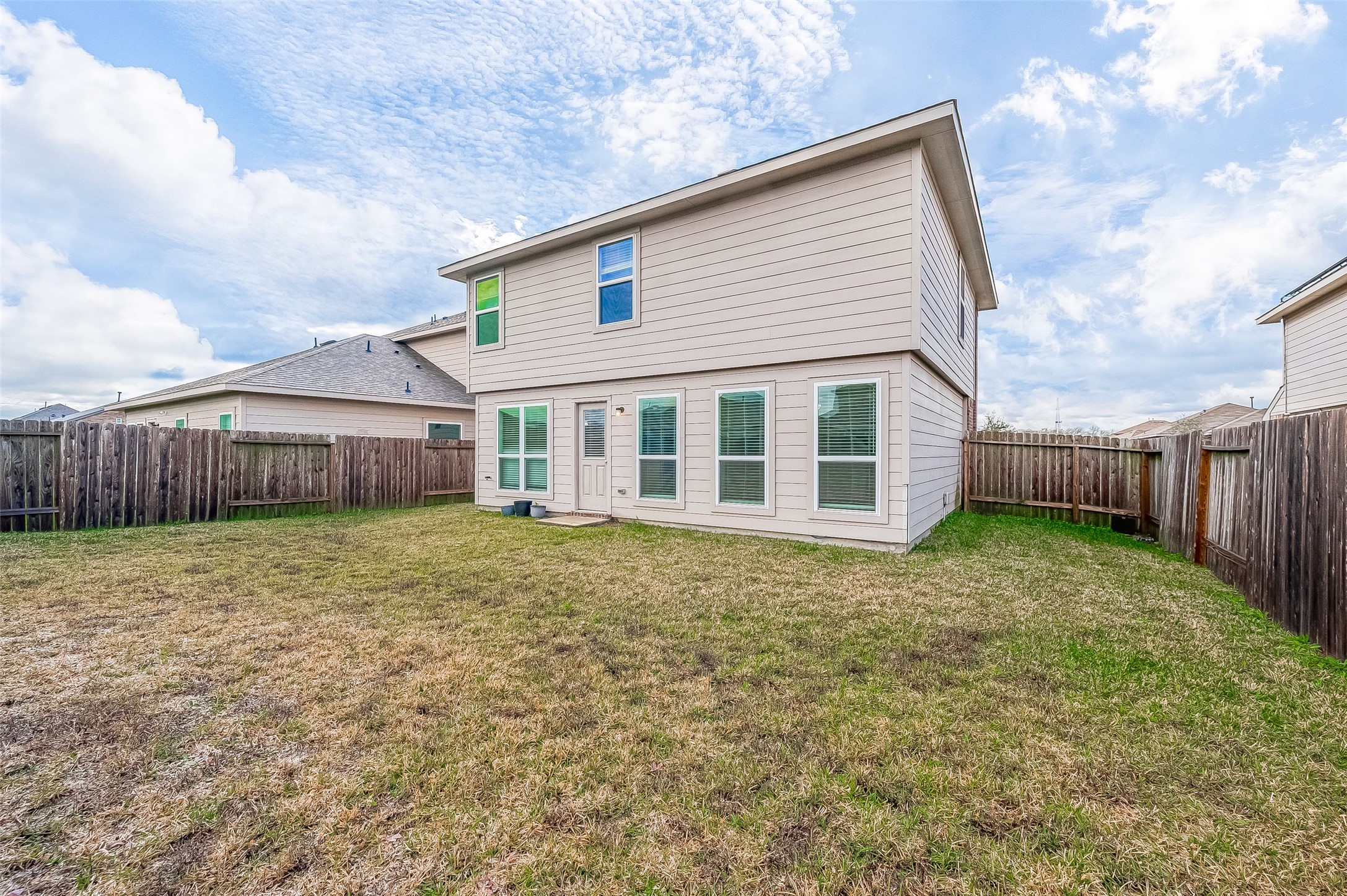 3406 Water Lilly Way Richmond, TX 77469 - Photo 42 of 44 a view of a house with a backyard