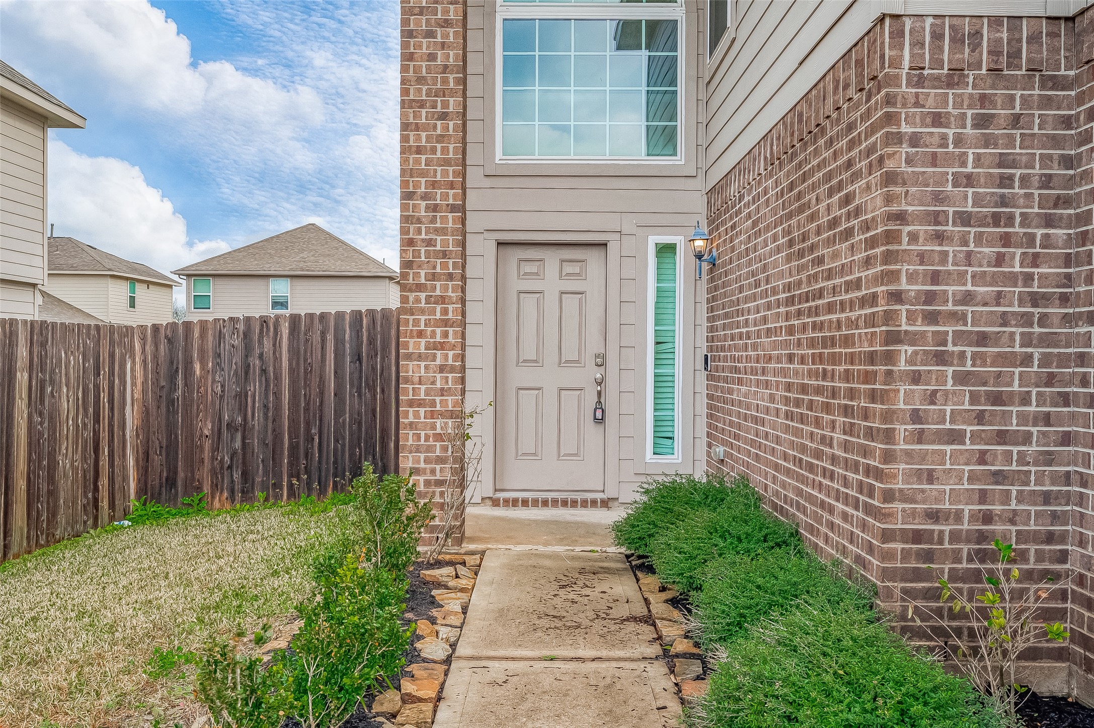 3406 Water Lilly Way Richmond, TX 77469 - Photo 6 of 44 a view of a pathway with a house